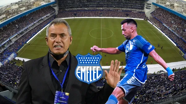 Hernán Torres frenando a un jugador de Emelec